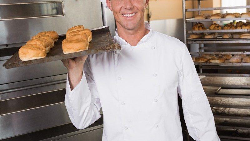 baker-holding-tray-of-fresh-bread-800x450
